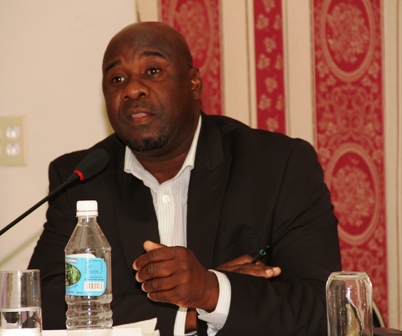 Minister responsible for Natural Resources, Energy and Environment in the Nevis Island Administration Hon. Alexis Jeffers at the town hall meeting hosted by the Nevis Island Administration on November 07, 2013. The event was held at the Red Cross conference room in Charlestown